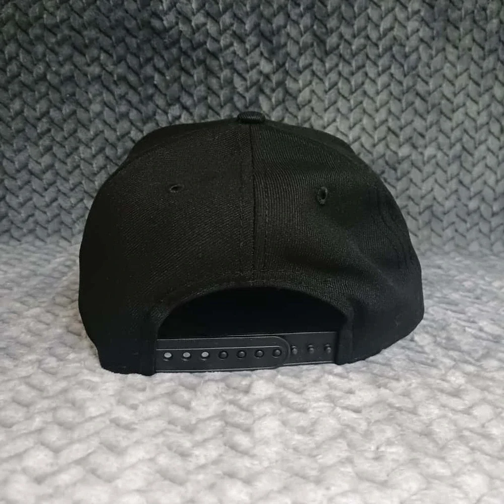 New Era Mens Chicago Bulls Snapback Hat Black On Black 9FORTY One Size Fits Most